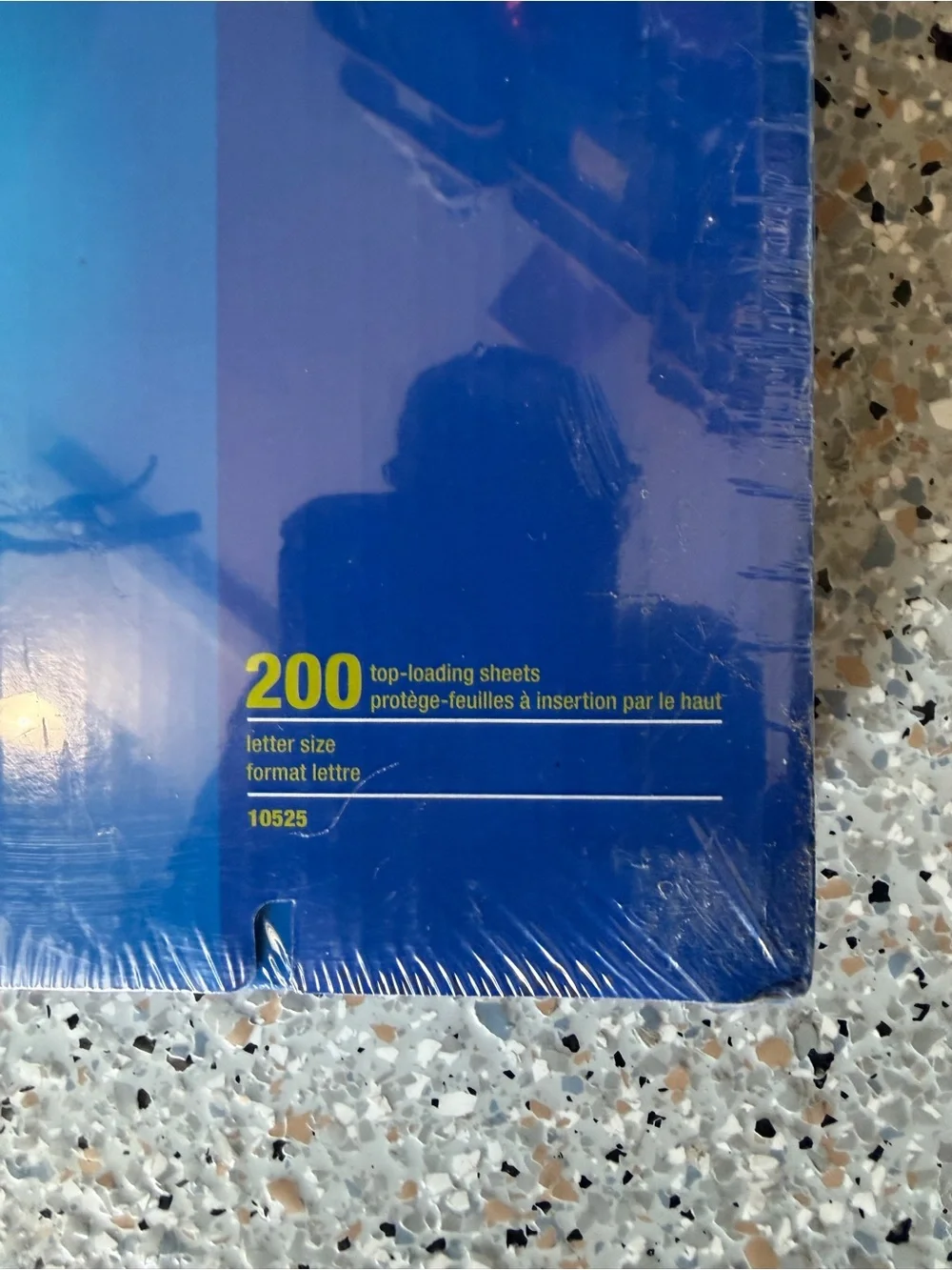 Staples blue and yellow clear sheet protectors package